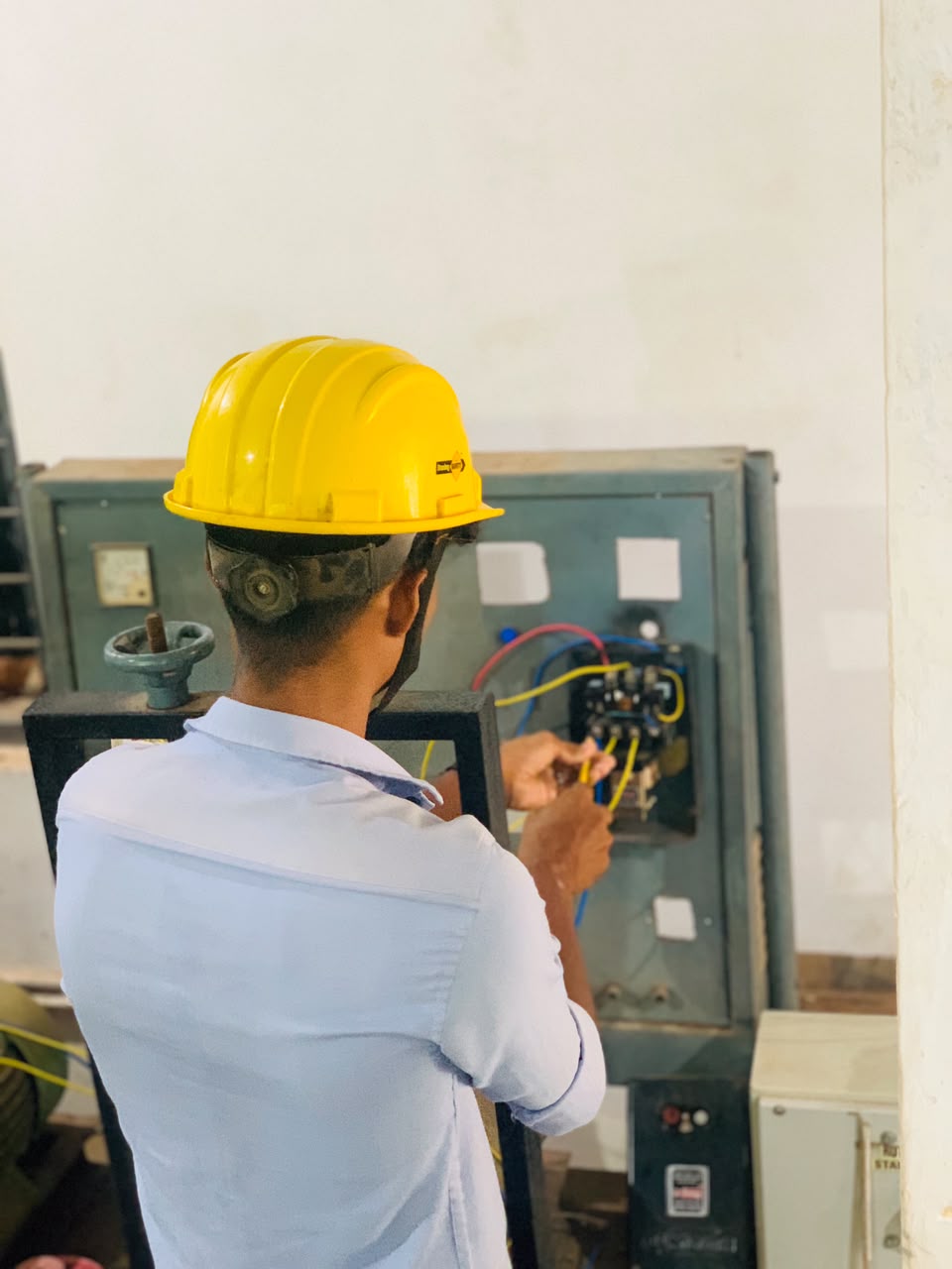 RAC student working on equipment